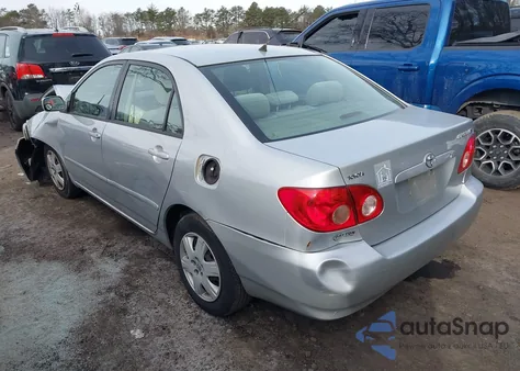2005 Toyota Corolla Le z USA, uszkodzony, nr VIN 2T1BR32E15C409033